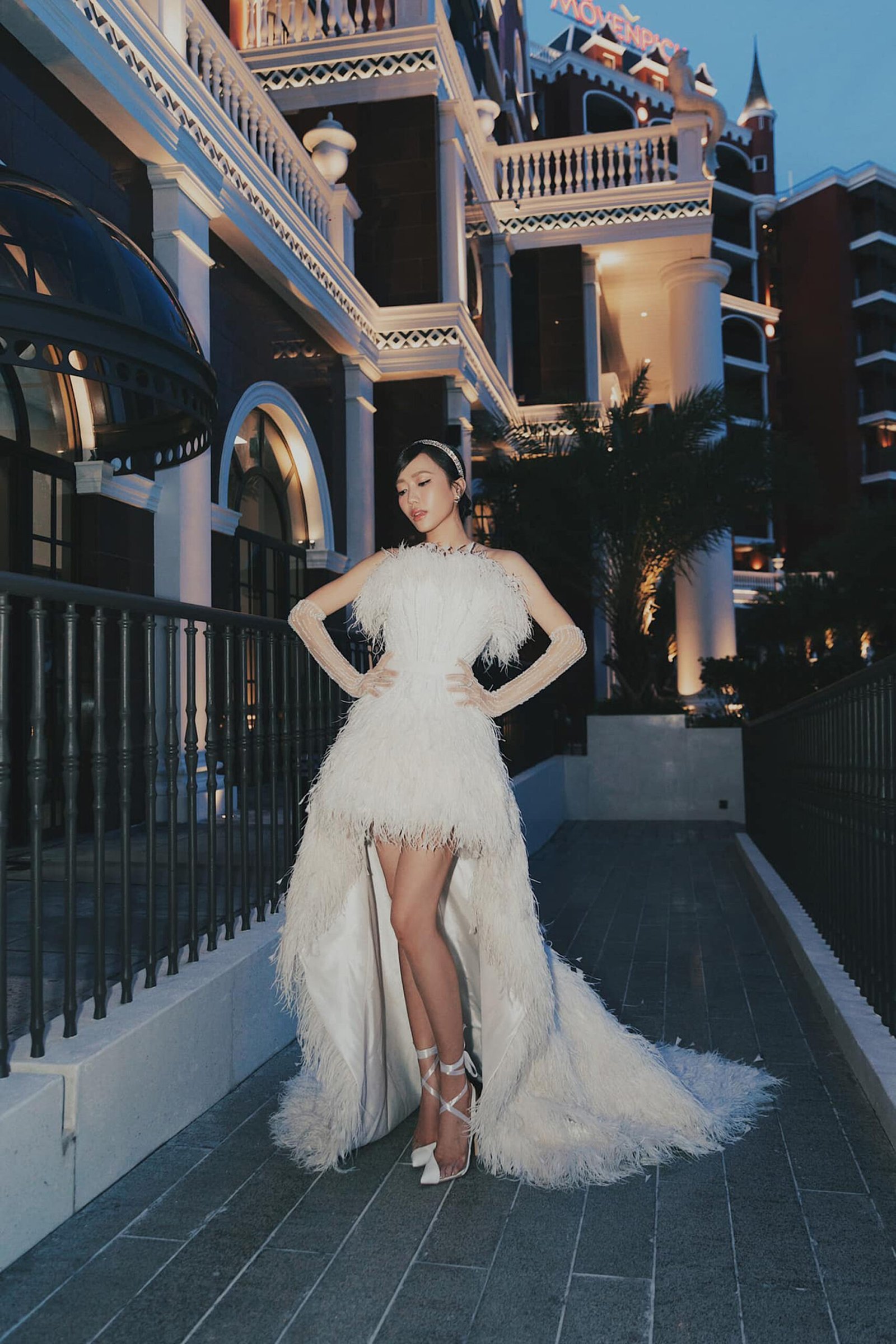 White Feather Embellished Mullet-Style Wedding Gown